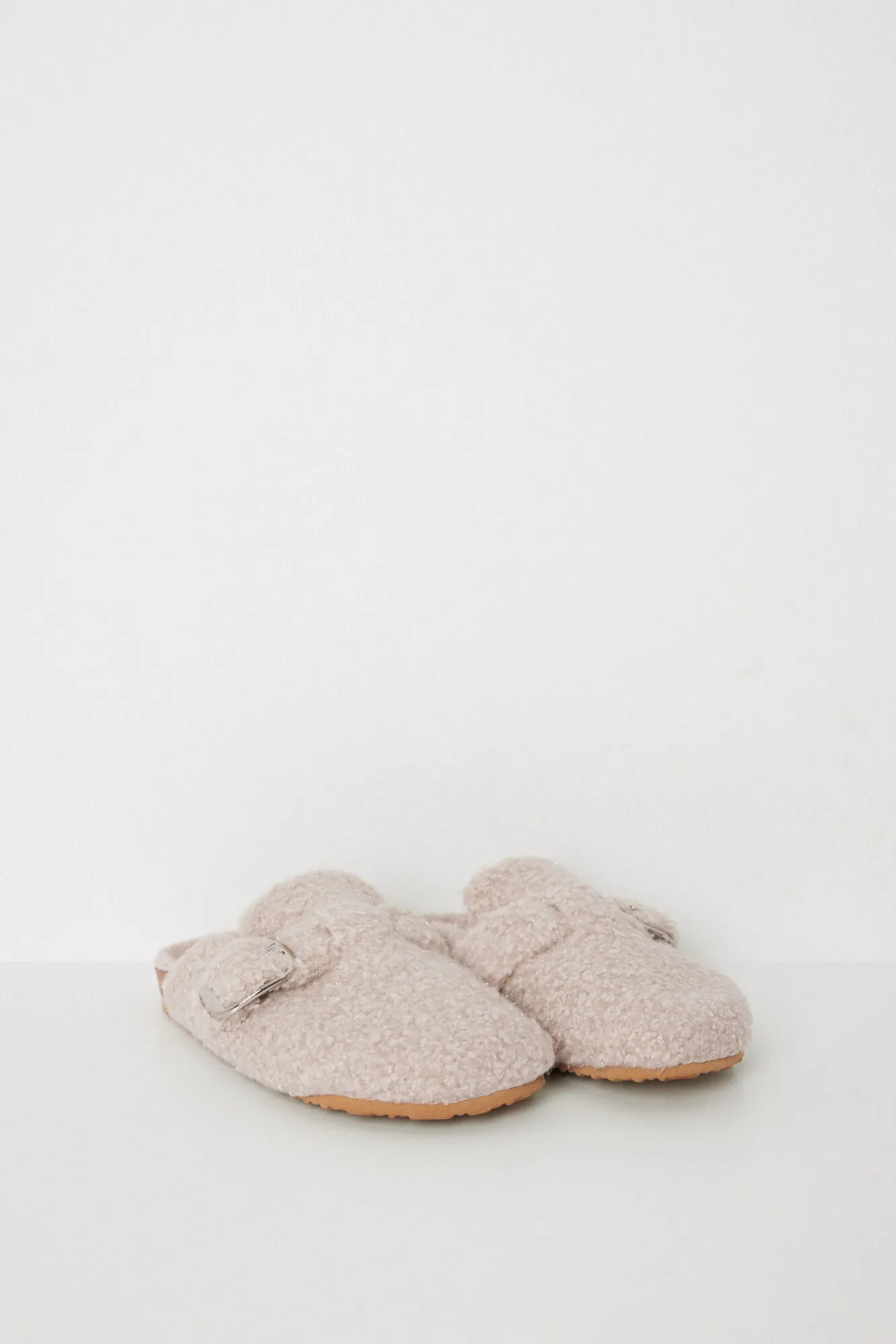 Raw faux shearling slippers