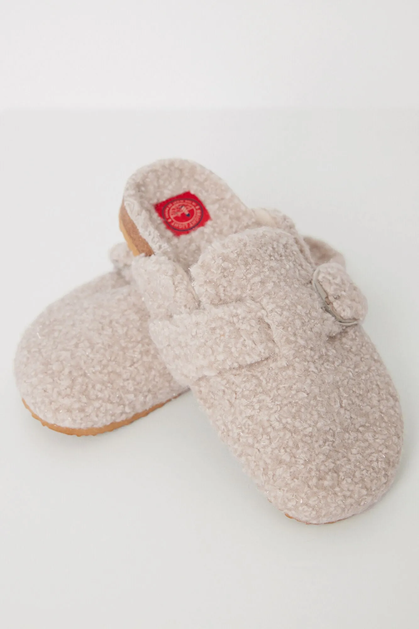 Raw faux shearling slippers